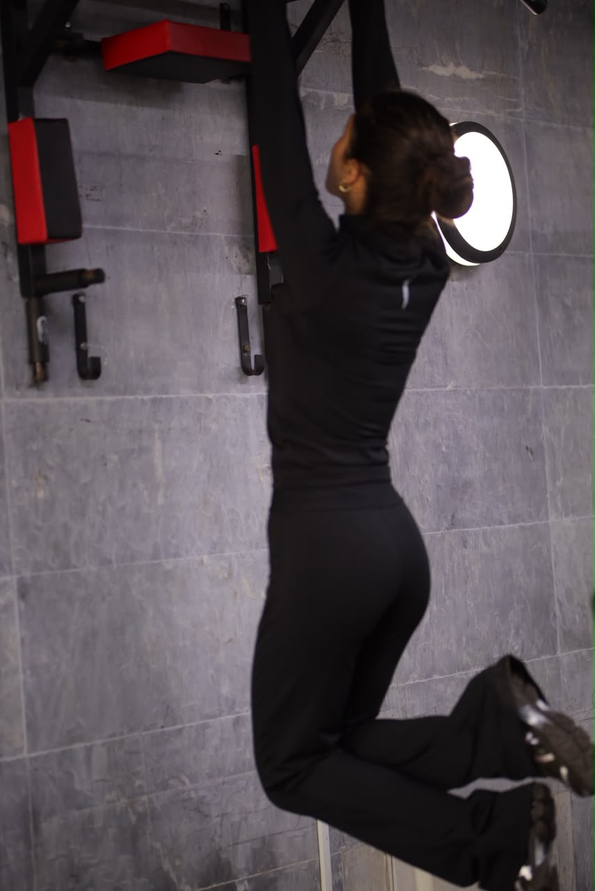 Black flare set worn training on a pull-up bar